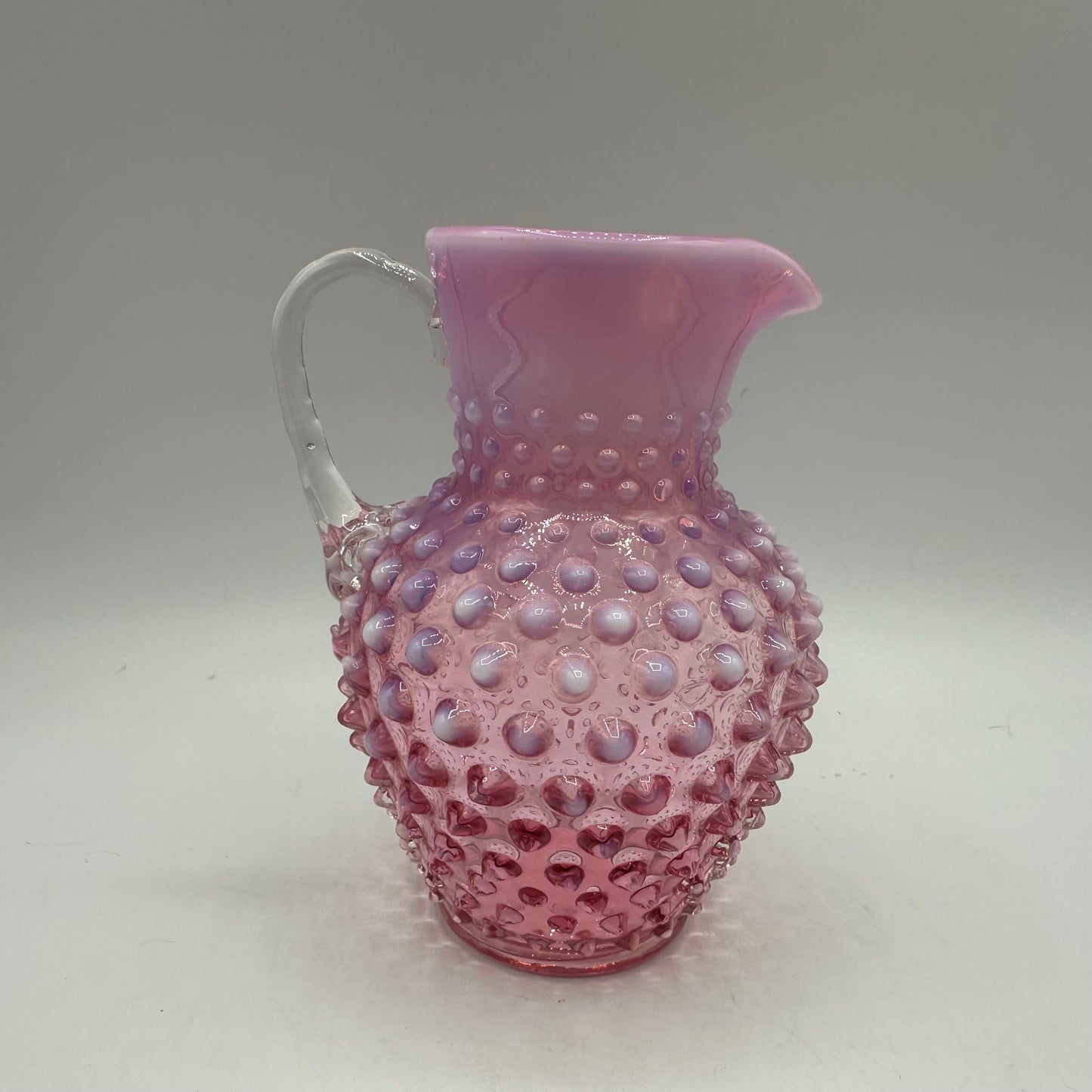 Fenton Cranberry Opalescent Hobnail Pitcher, 5.75"