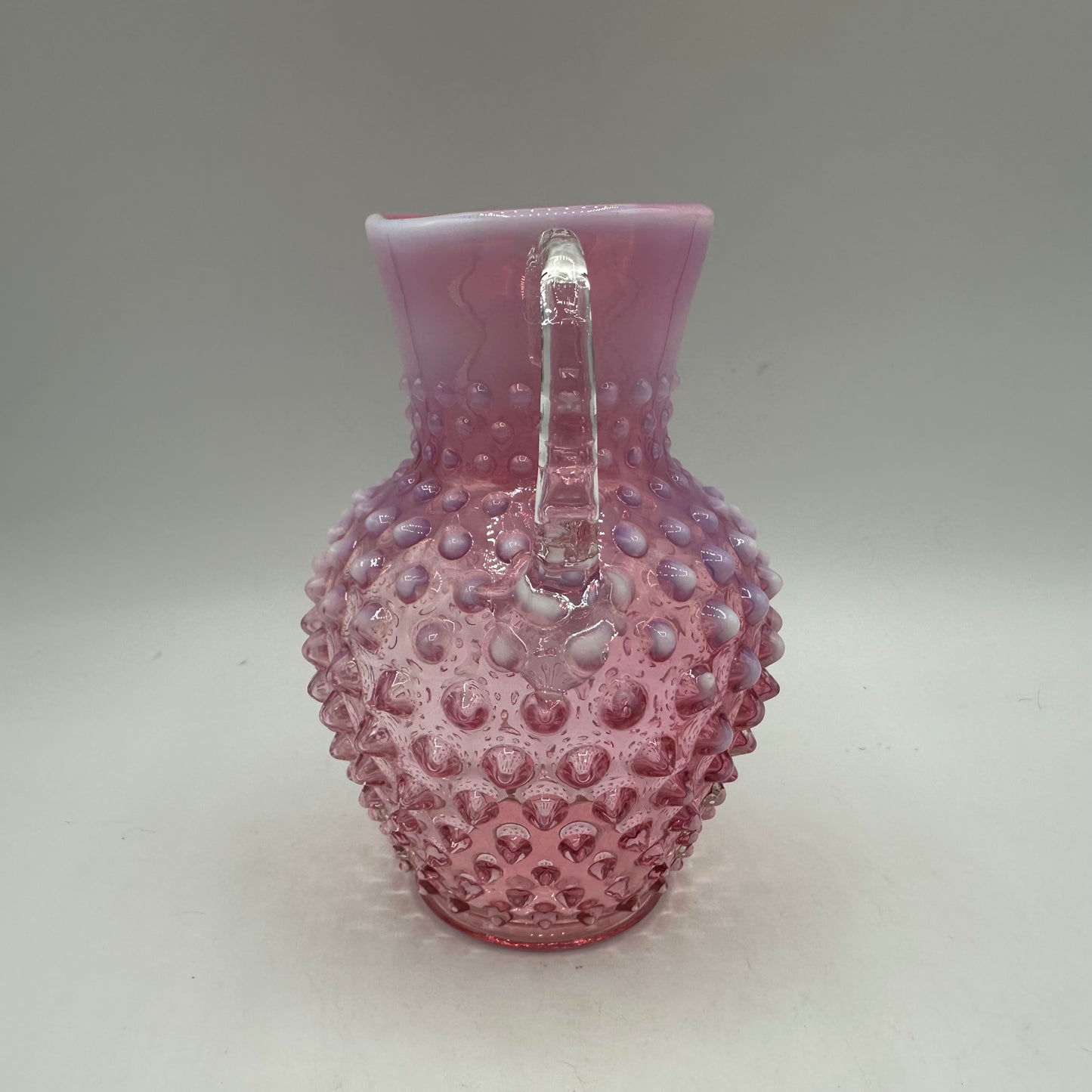 Fenton Cranberry Opalescent Hobnail Pitcher, 5.75"
