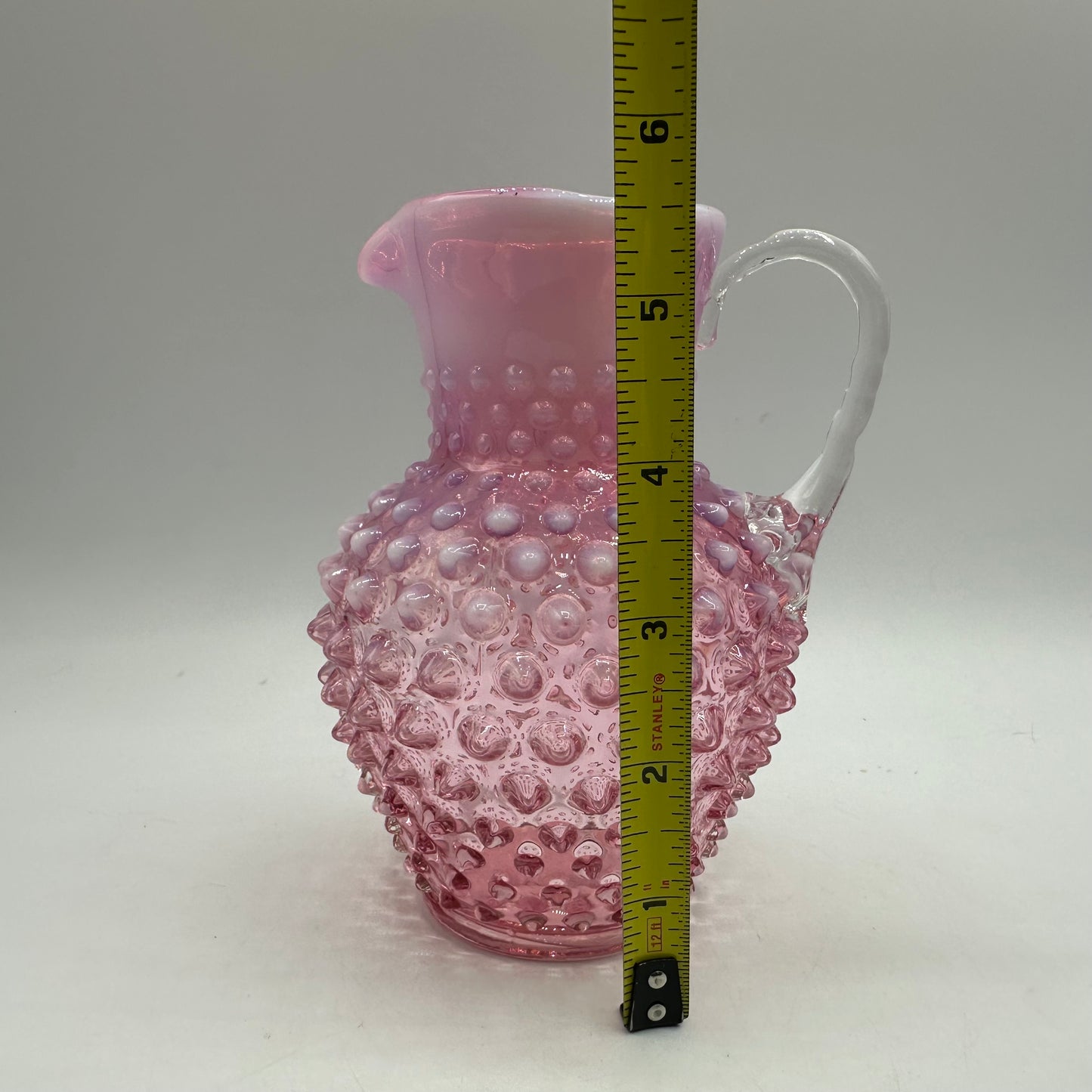 Fenton Cranberry Opalescent Hobnail Pitcher, 5.75"