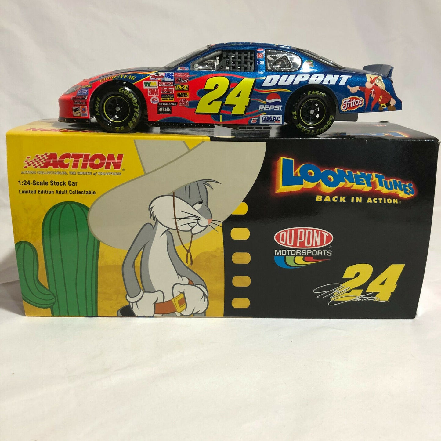 1:24 Jeff Gordon #24 DuPont/Looney Tunes 2003 Monte Carlo Action NASCAR - Nostalgia 2 Now