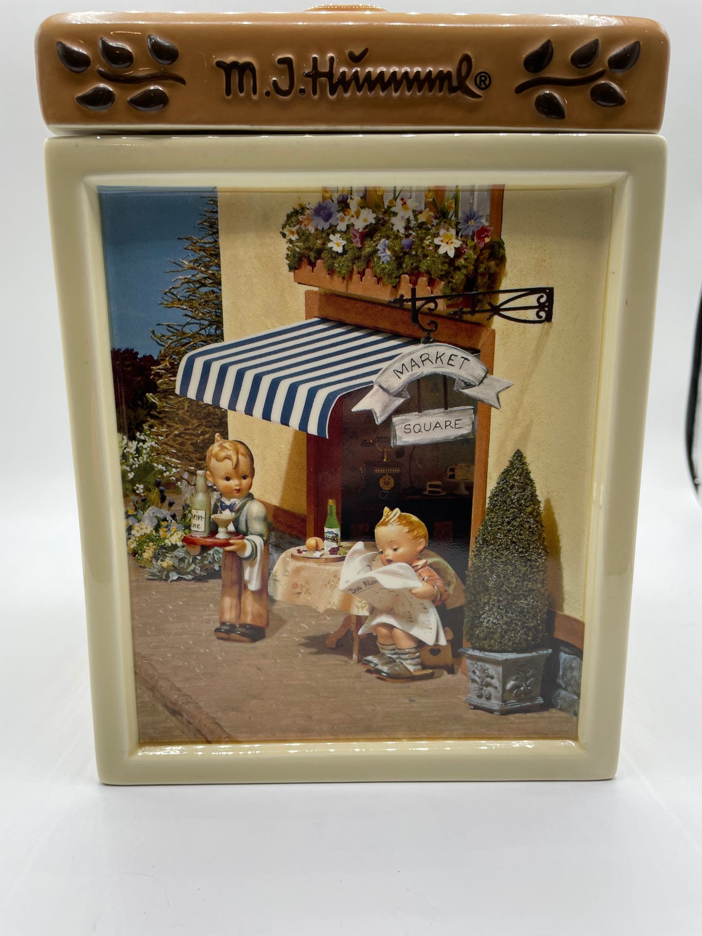 M.J. Hummel Square Canister “Waiter, Latest News”