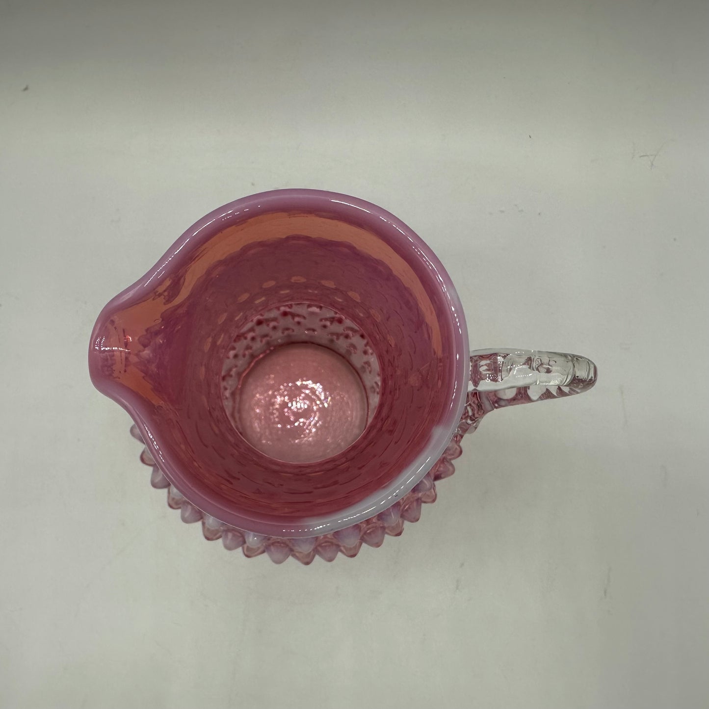 Fenton Cranberry Opalescent Hobnail Pitcher, 5.75"