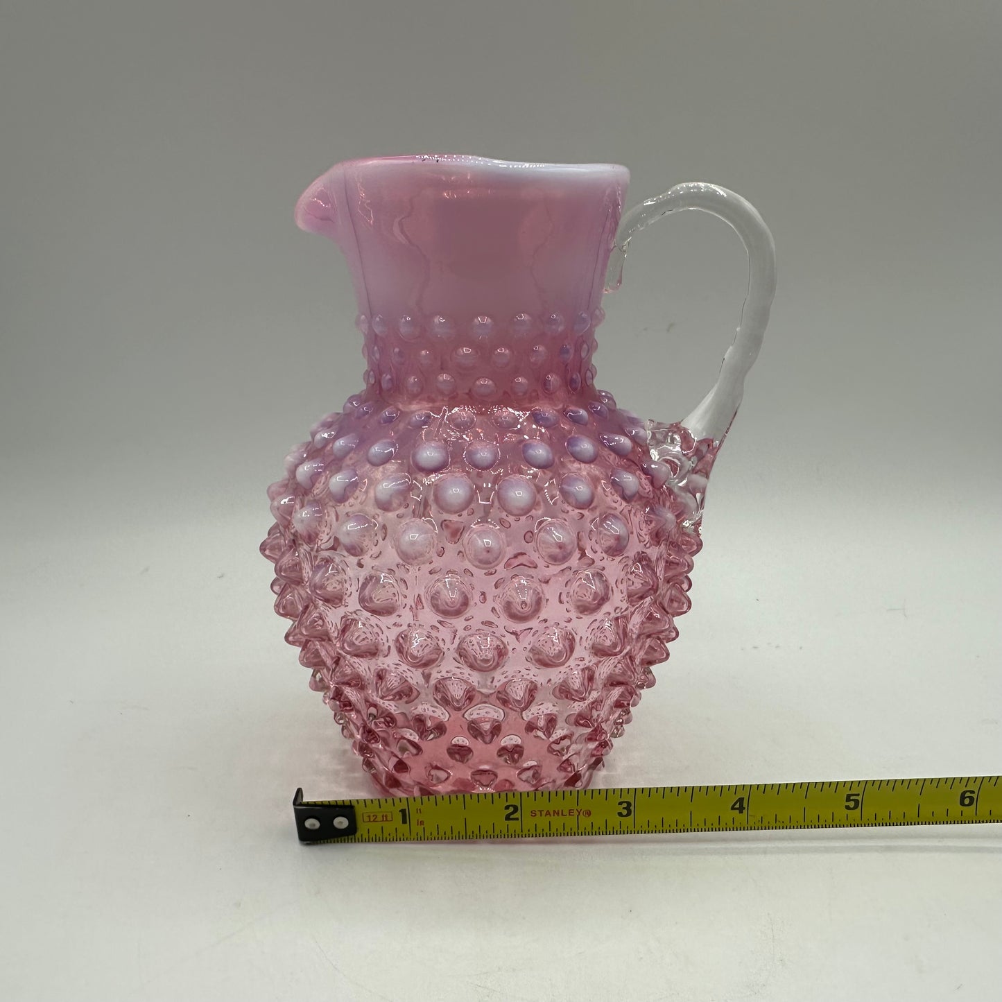 Fenton Cranberry Opalescent Hobnail Pitcher, 5.75"