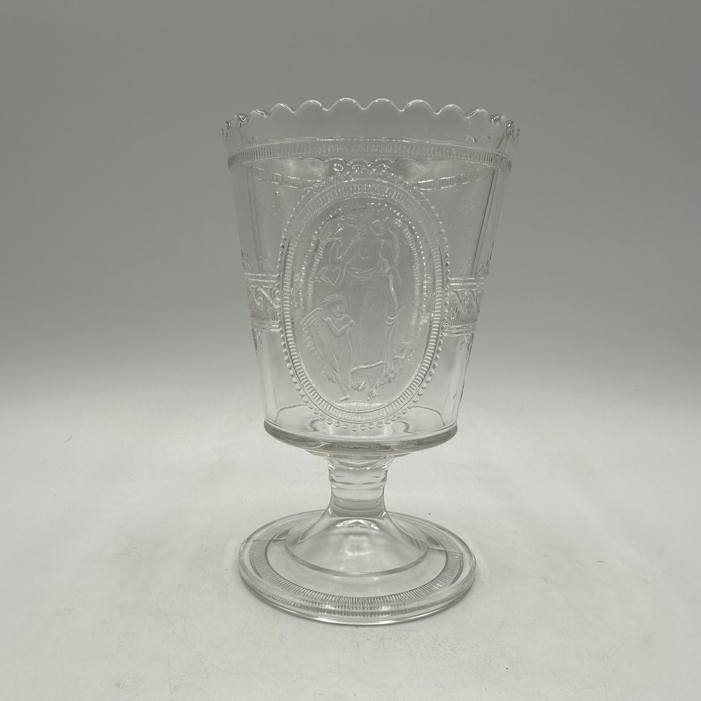 Richards & Hartley Glass Company Footed Cupid & Venus Spooner