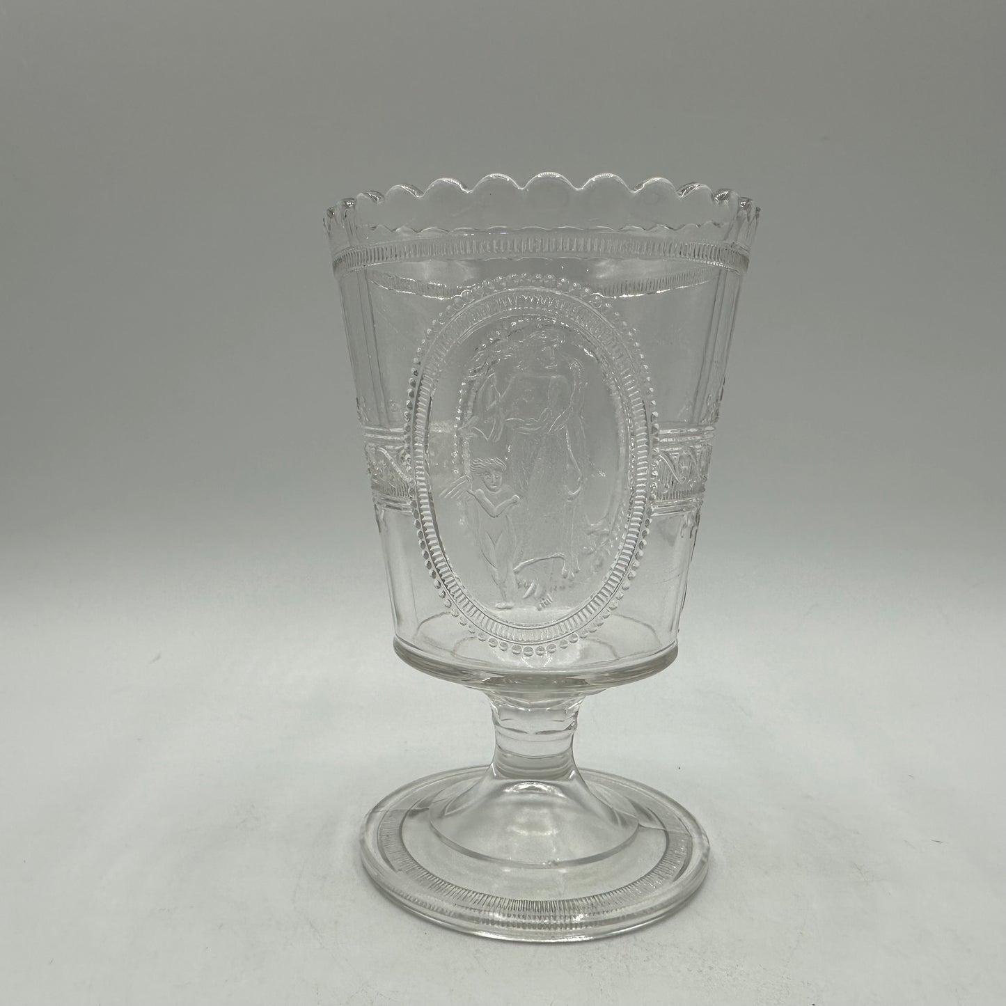 Richards & Hartley Glass Company Footed Cupid & Venus Spooner