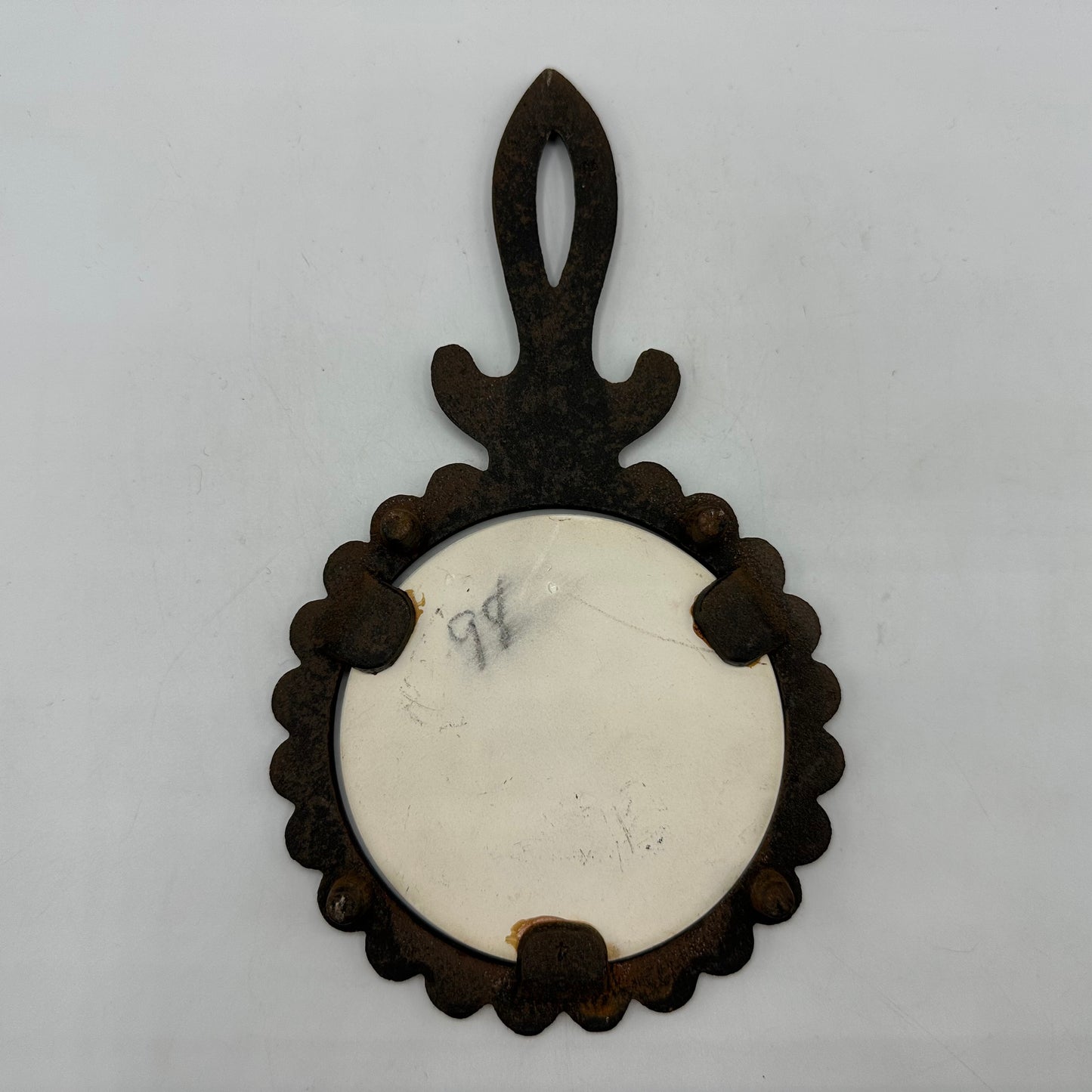 Currier and Ives Cast Iron Footed Trivet