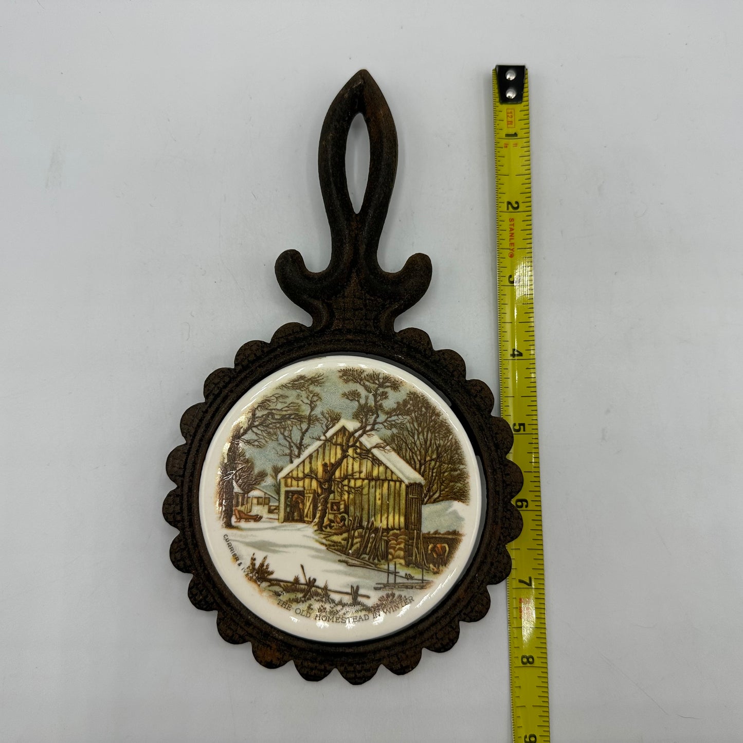 Currier and Ives Cast Iron Footed Trivet