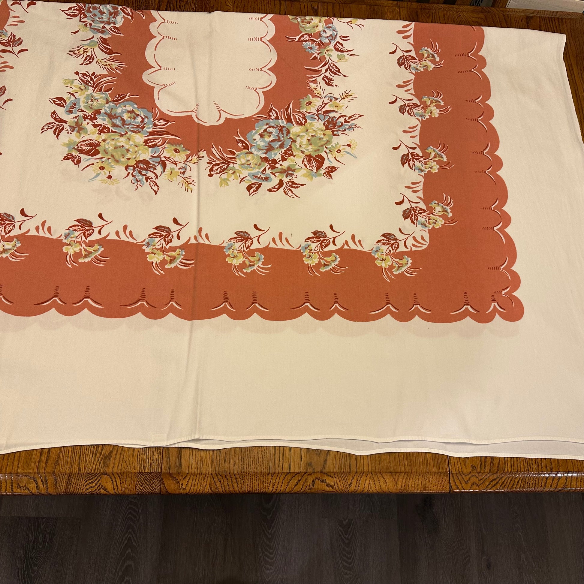 Floral-patterned tablecloth on a wooden table