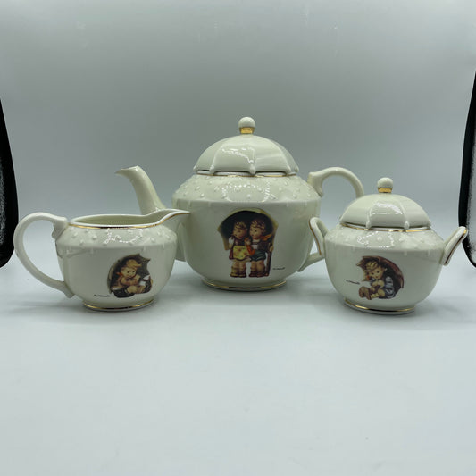 M.J. Hummel "Stormy Weather" Teapot, Creamer and Sugar Bowl Set Danbury Mint