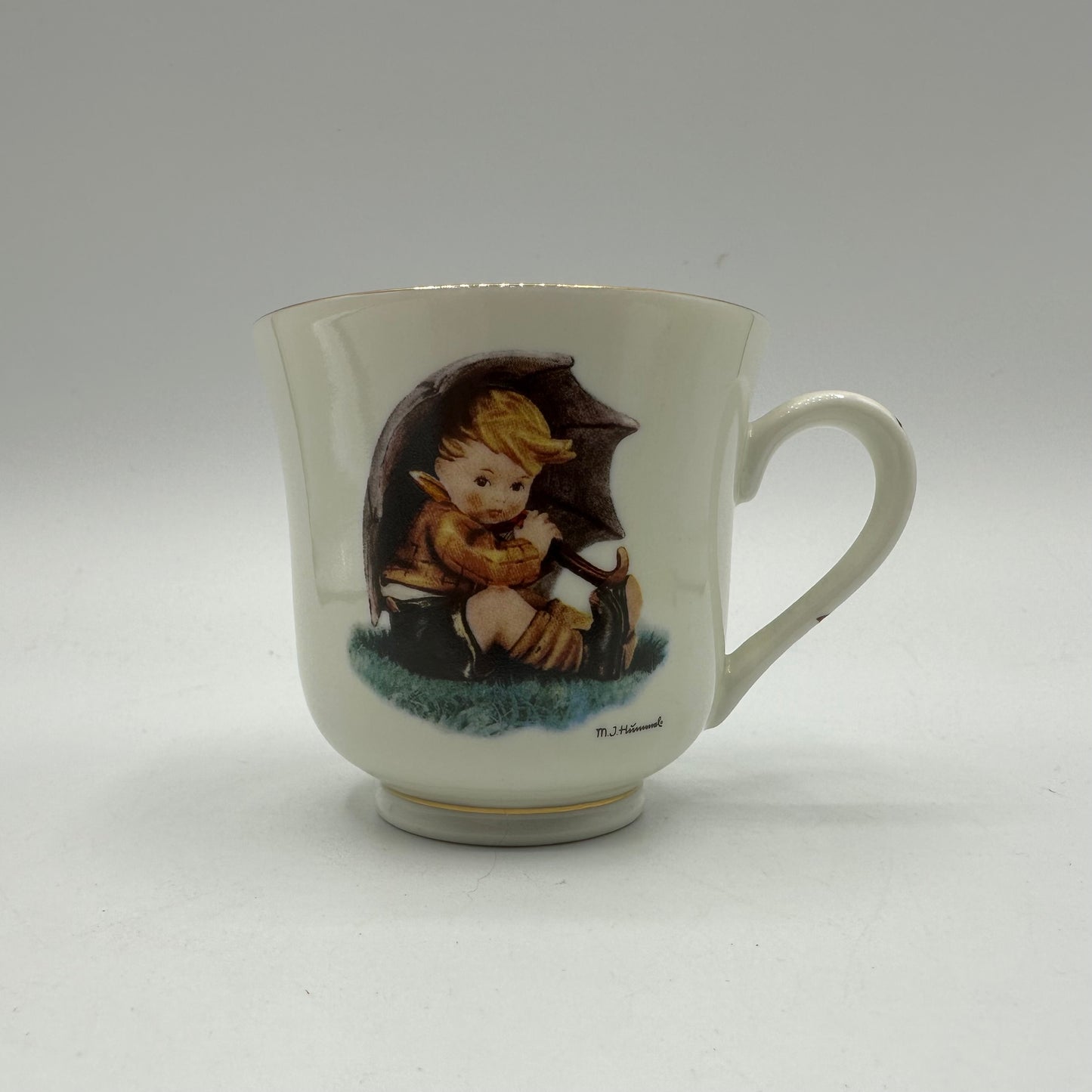 M.J. Hummel "Umbrella Boy" Cup and Saucer