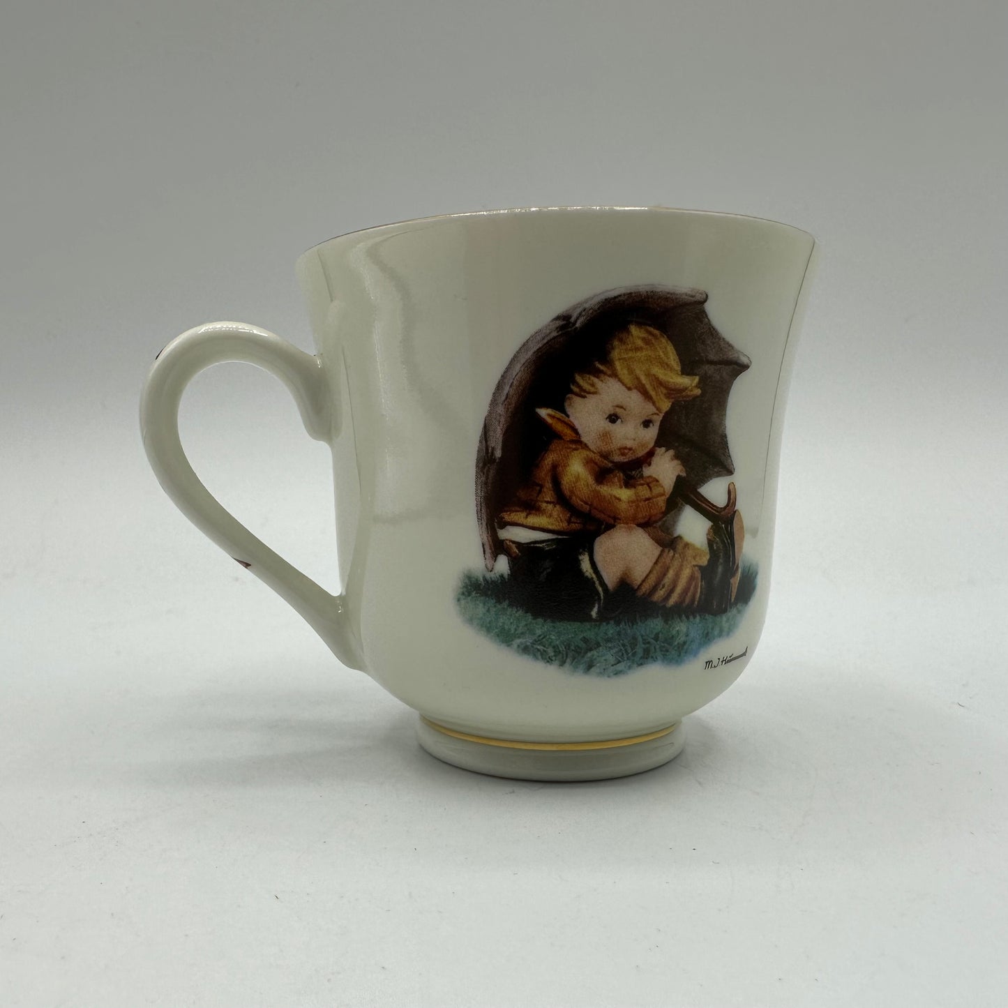 M.J. Hummel "Umbrella Boy" Cup and Saucer