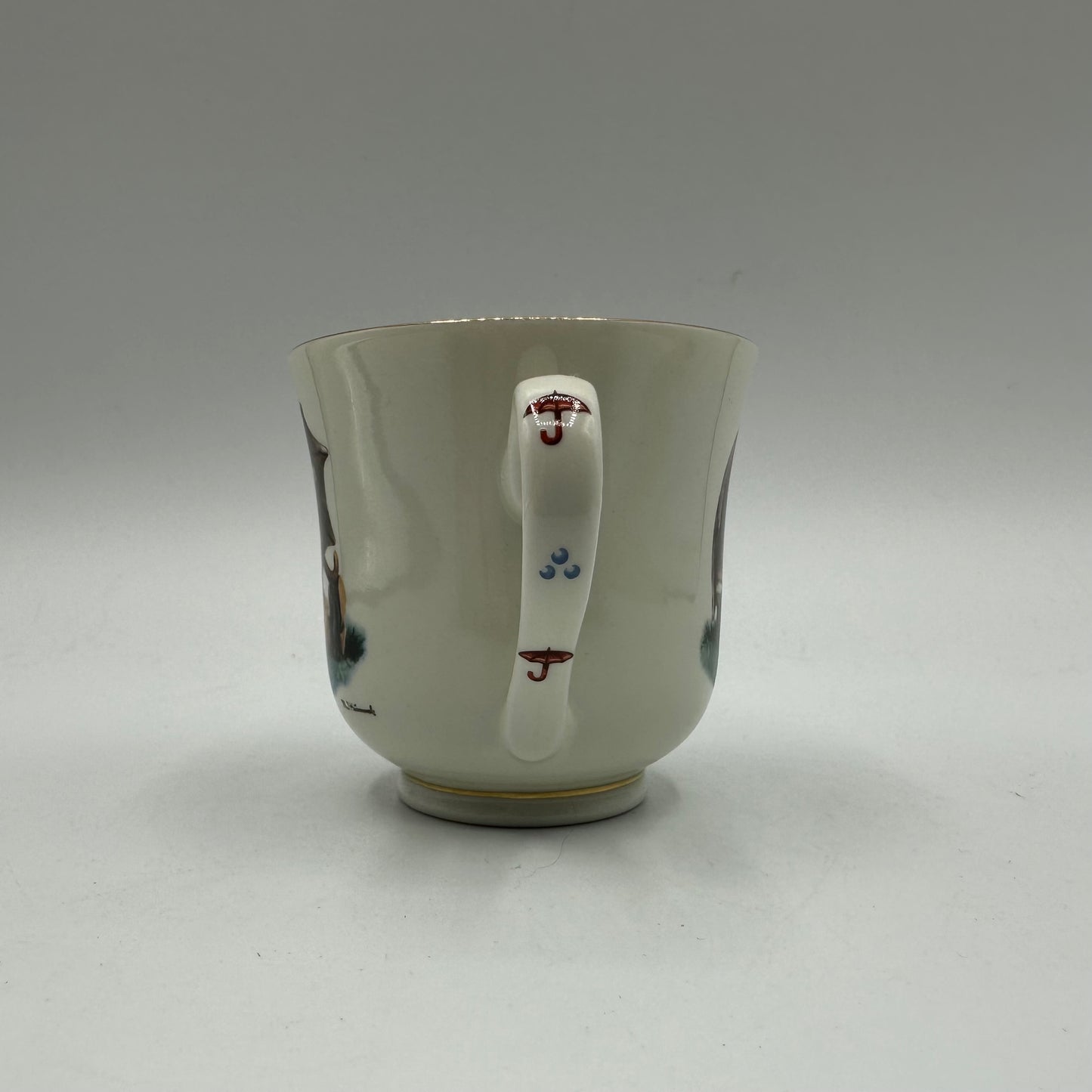 M.J. Hummel "Umbrella Boy" Cup and Saucer