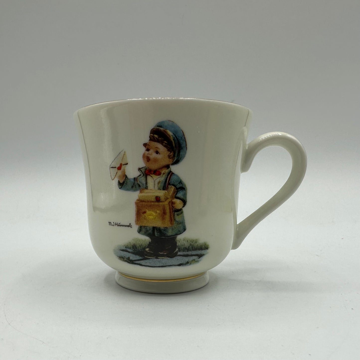 M.J. Hummel "Postman" Cup and Saucer