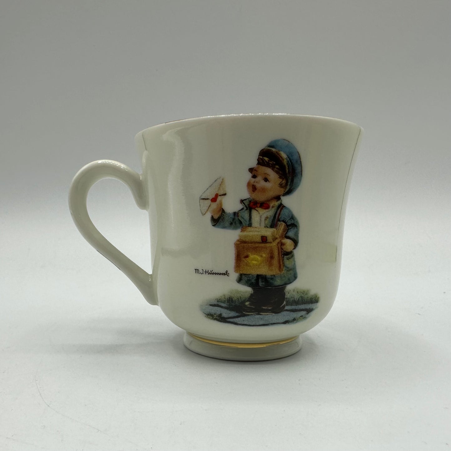 M.J. Hummel "Postman" Cup and Saucer