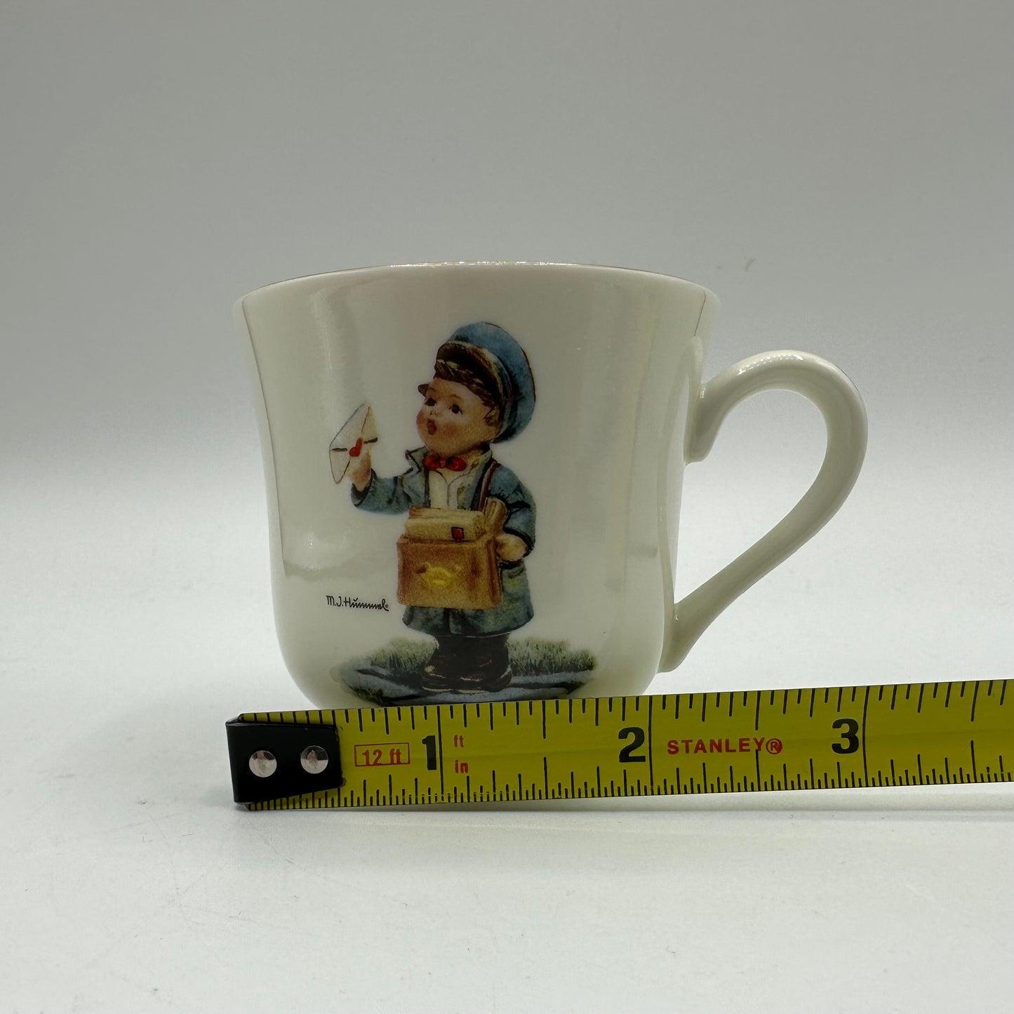 M.J. Hummel "Postman" Cup and Saucer