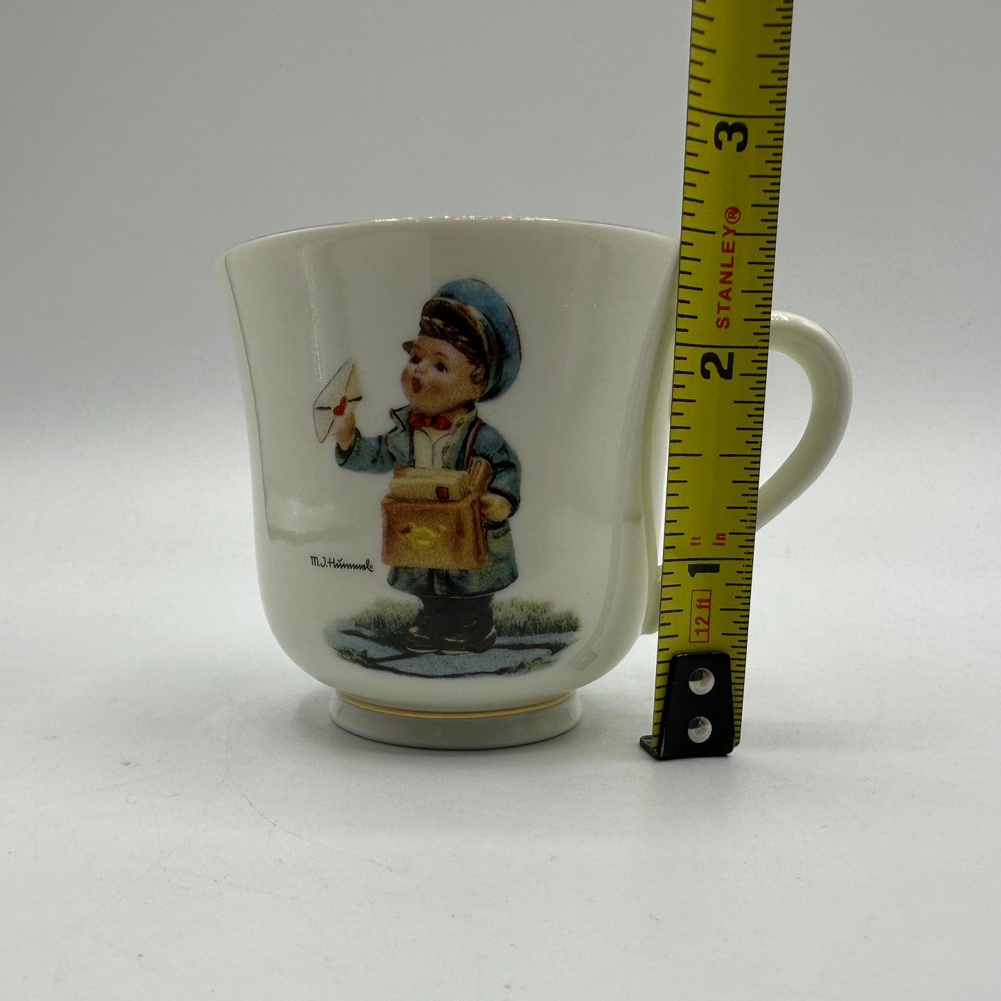 M.J. Hummel "Postman" Cup and Saucer