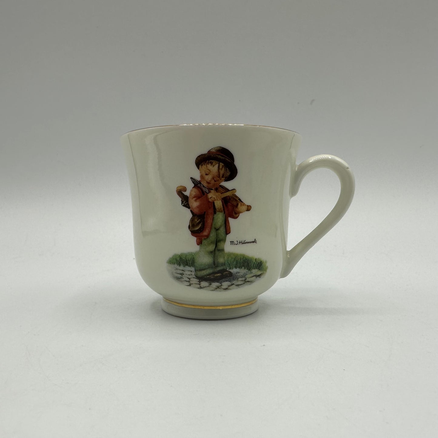 M.J. Hummel "Little Fiddler" Cup and Saucer