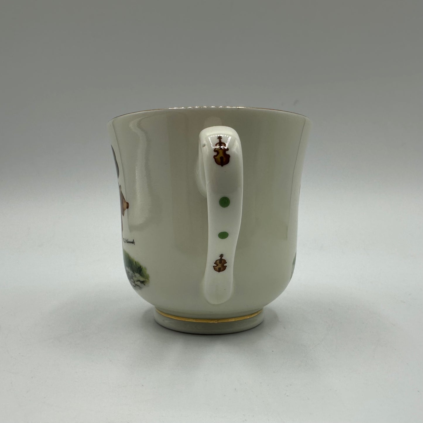 M.J. Hummel "Little Fiddler" Cup and Saucer