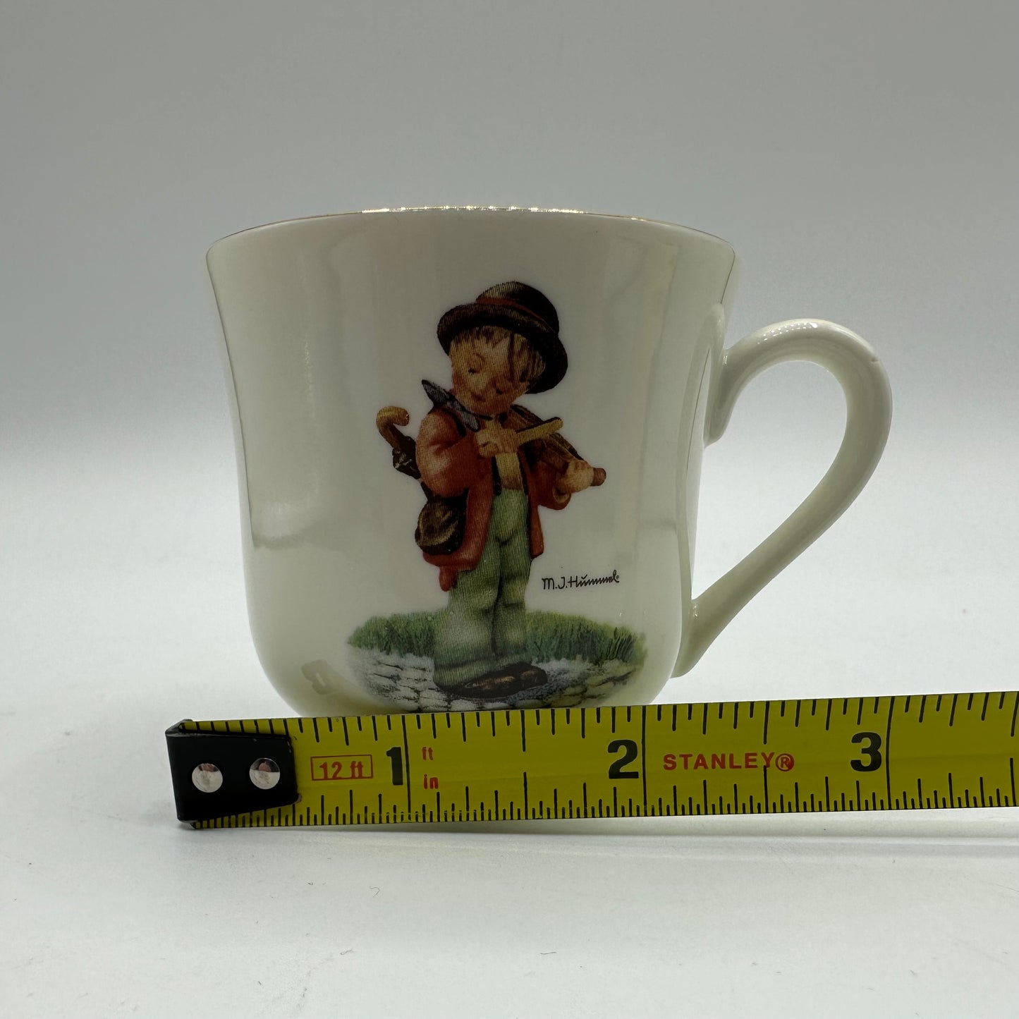 M.J. Hummel "Little Fiddler" Cup and Saucer