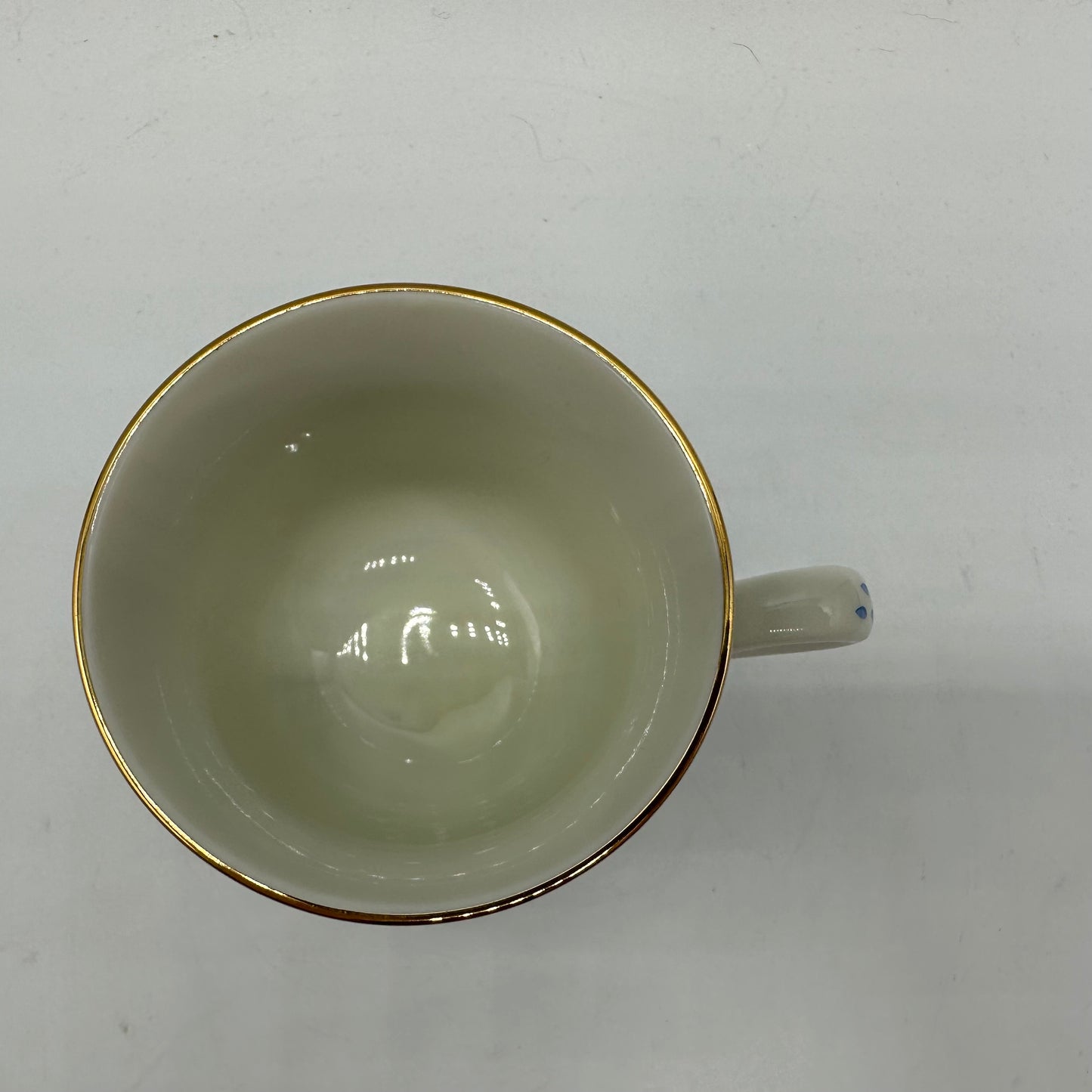 M.J. Hummel "Umbrella Girl" Cup and Saucer