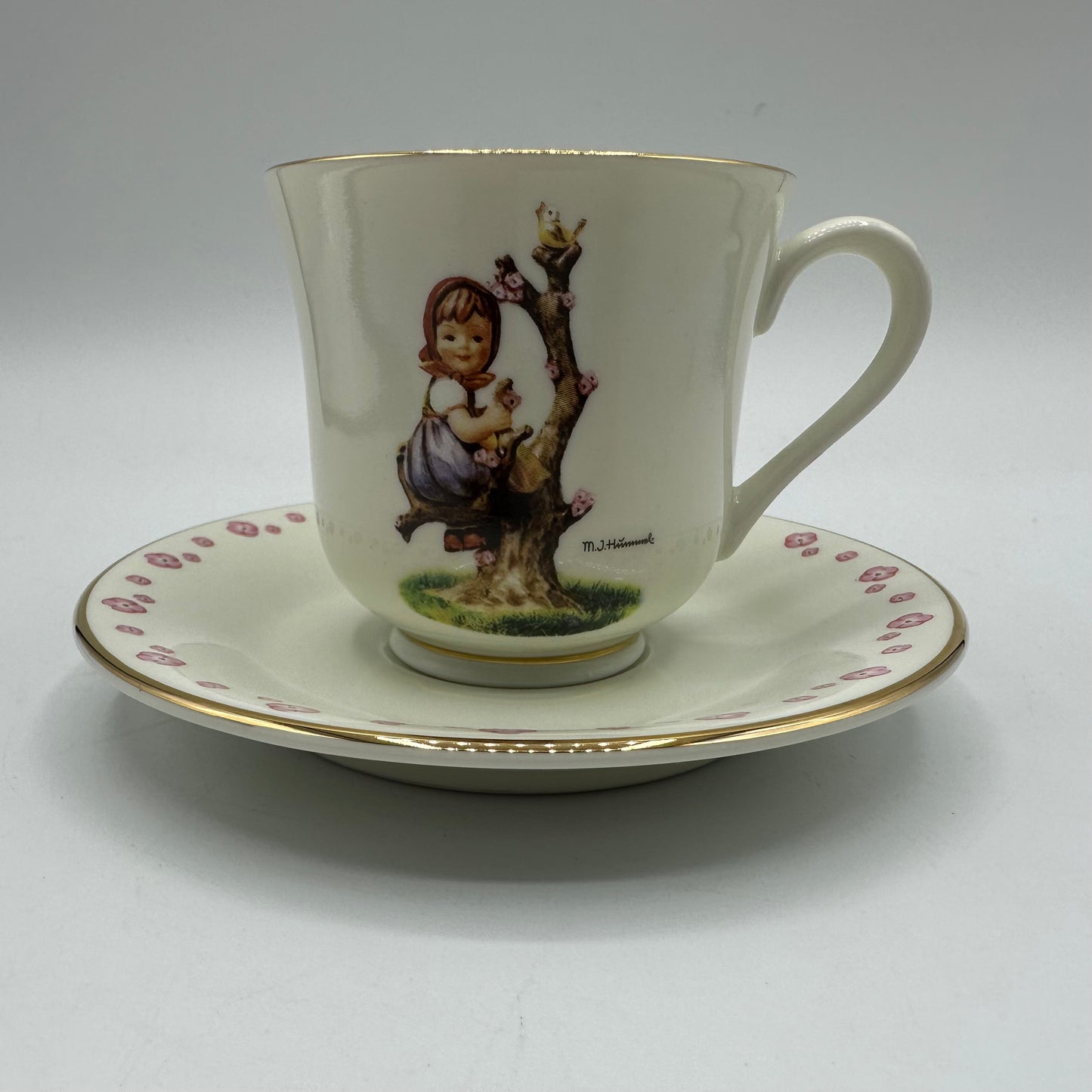 M.J. Hummel "Apple Tree Girl" Cup and Saucer