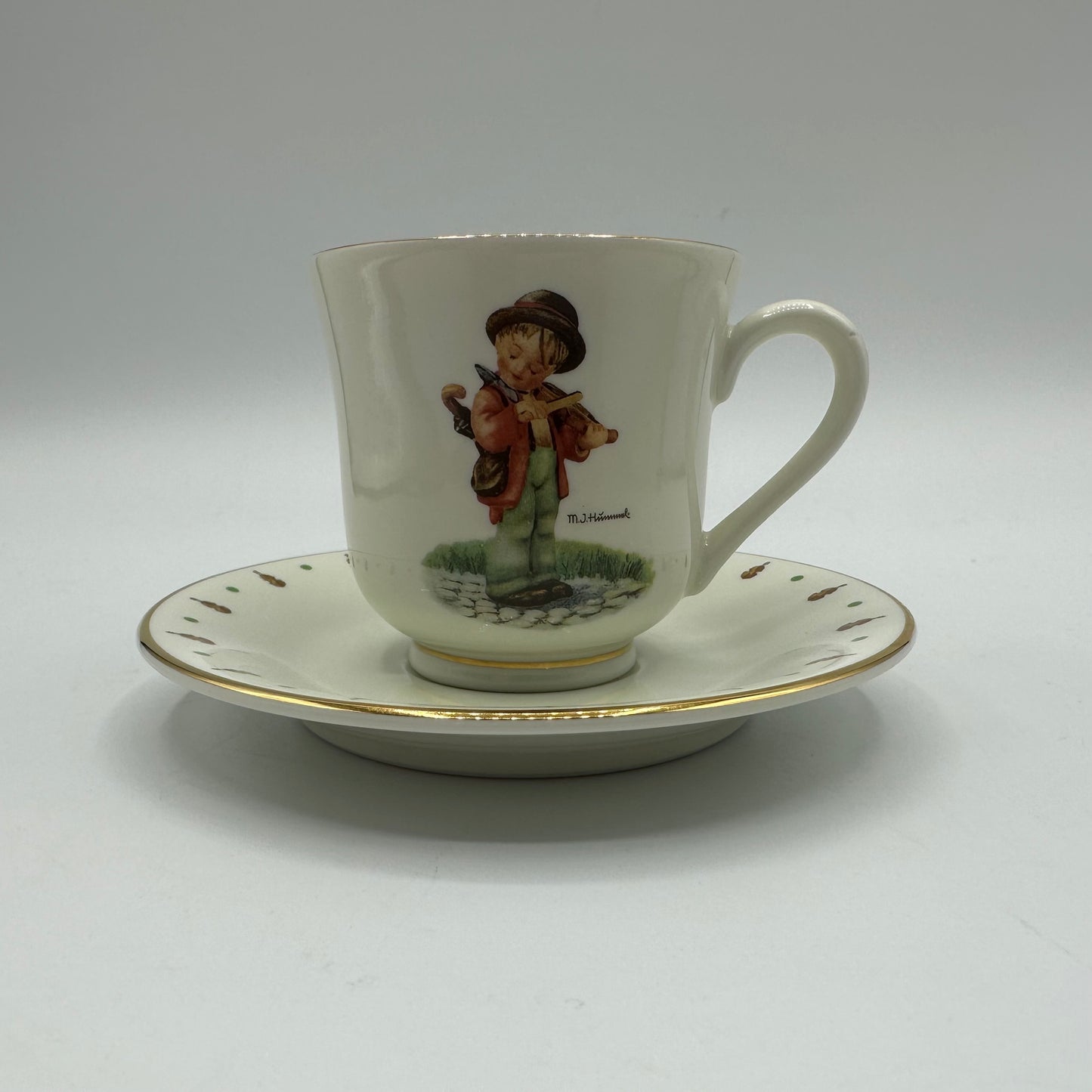 M.J. Hummel "Little Fiddler" Cup and Saucer