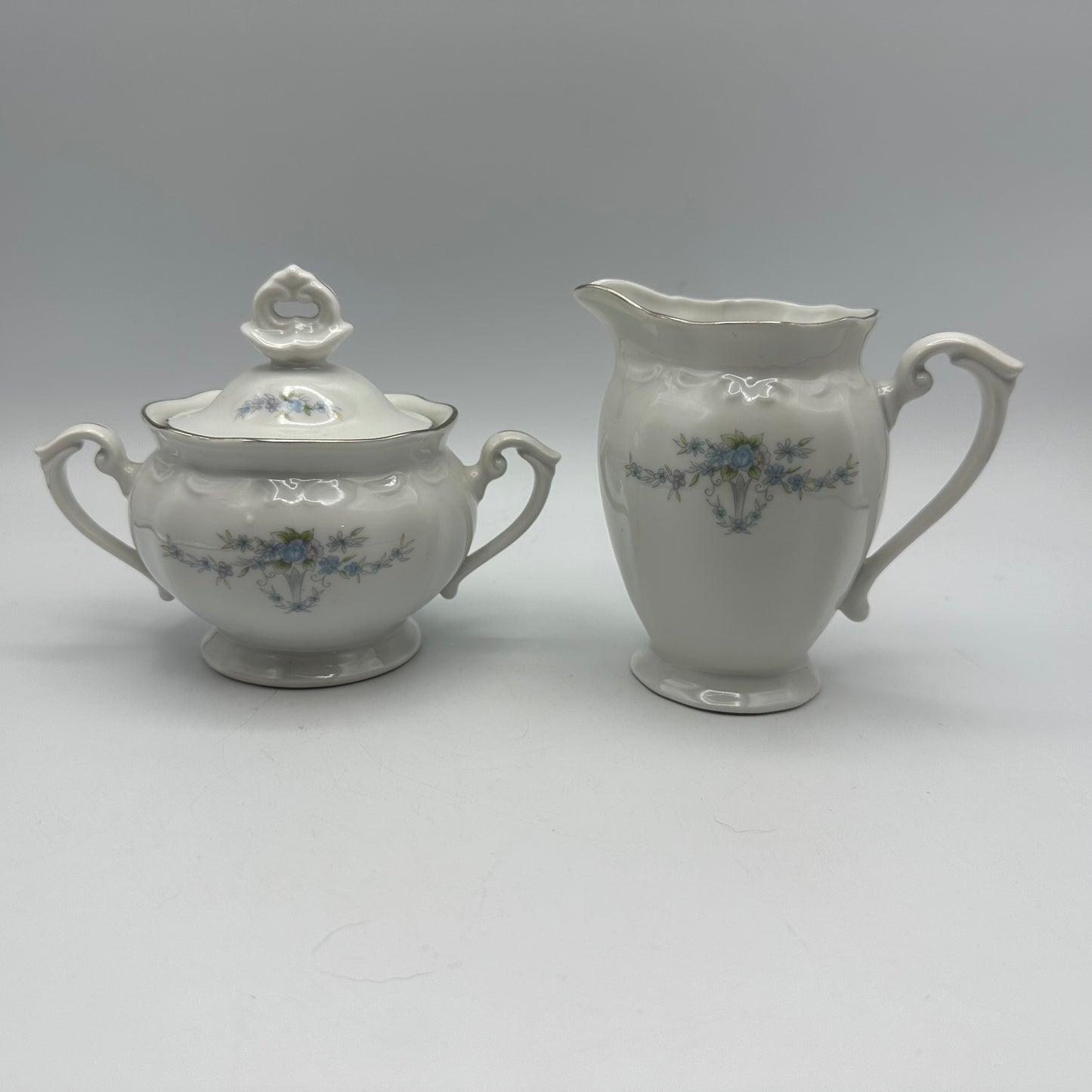 Chodziez Sugar Bowl & Creamer Blue Floral Swag