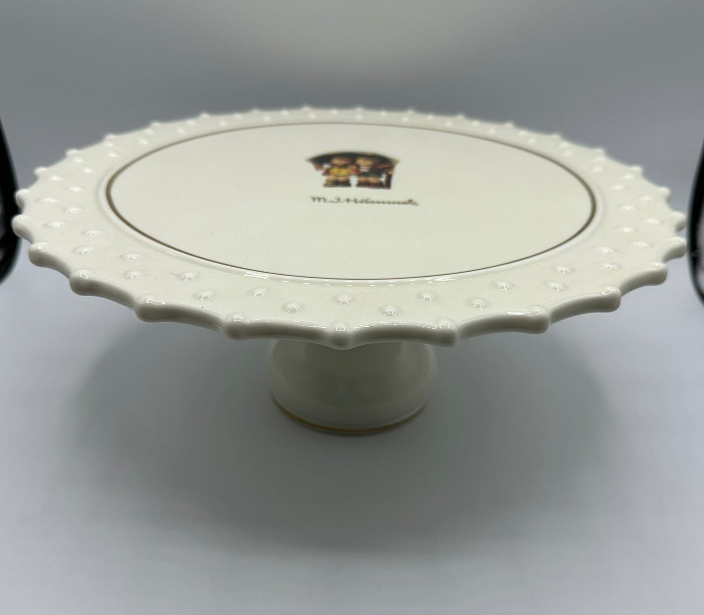 M.J. Hummel Hostess Collection Cake Stand "Stormy Weather"