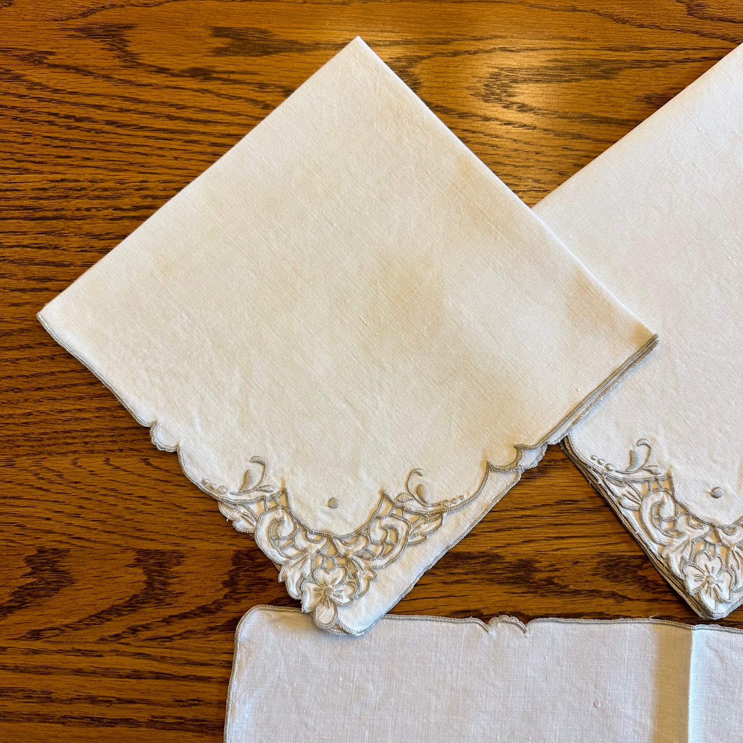 Ivory With Taupe Boarder Linen Napkins, Floral Cutwork Corner Design, Set of 4