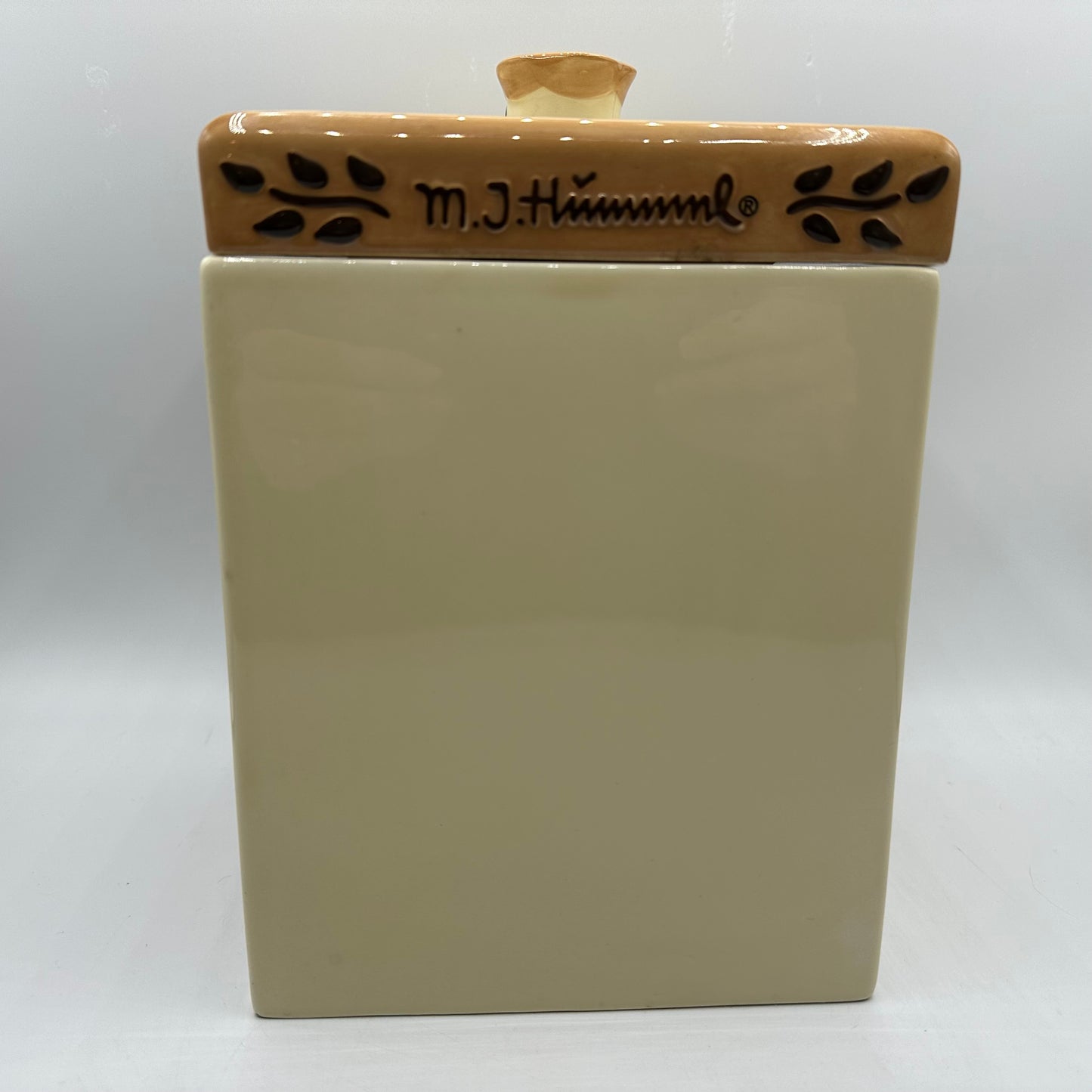 M.J. Hummel Square Canister “Waiter, Latest News”