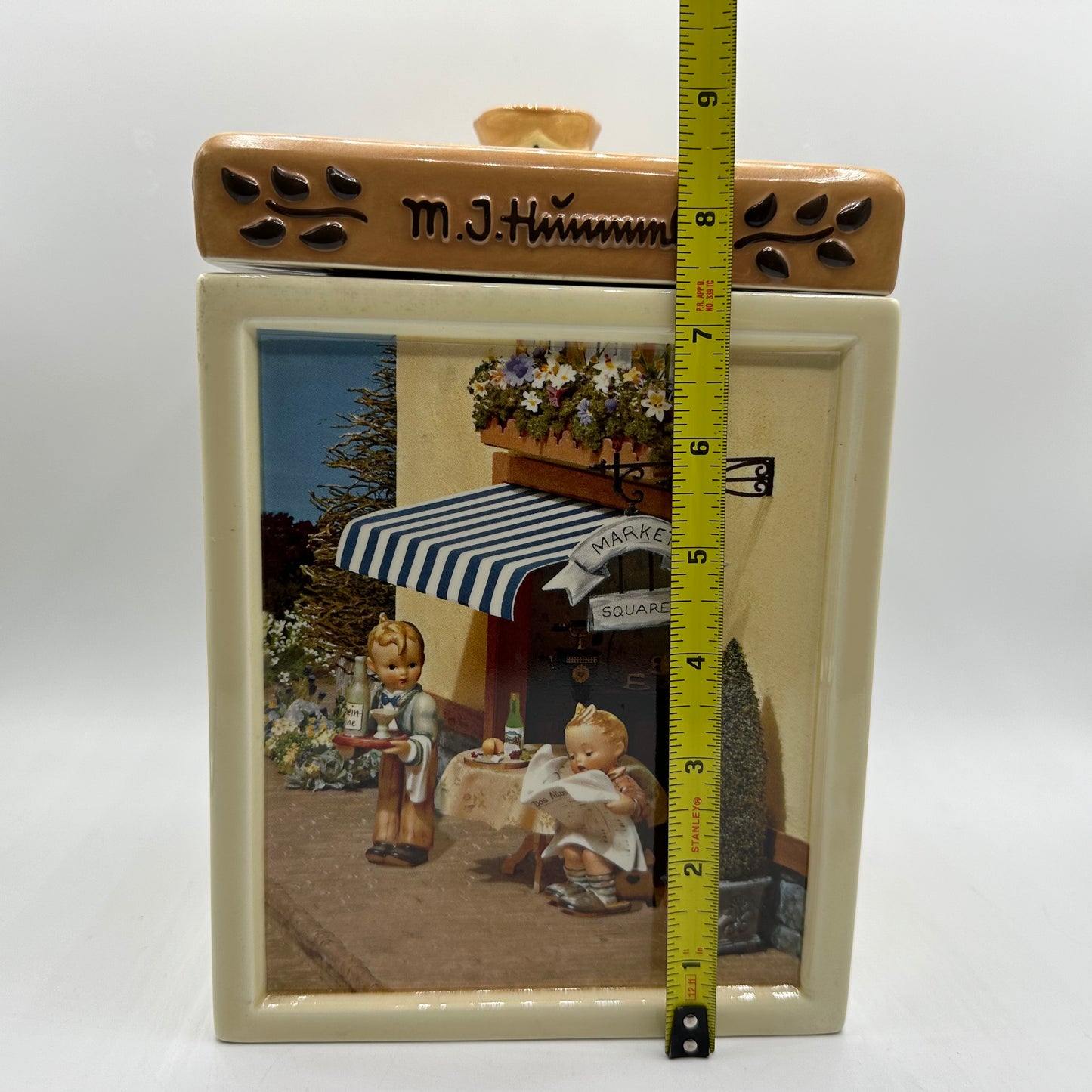 M.J. Hummel Square Canister “Waiter, Latest News”